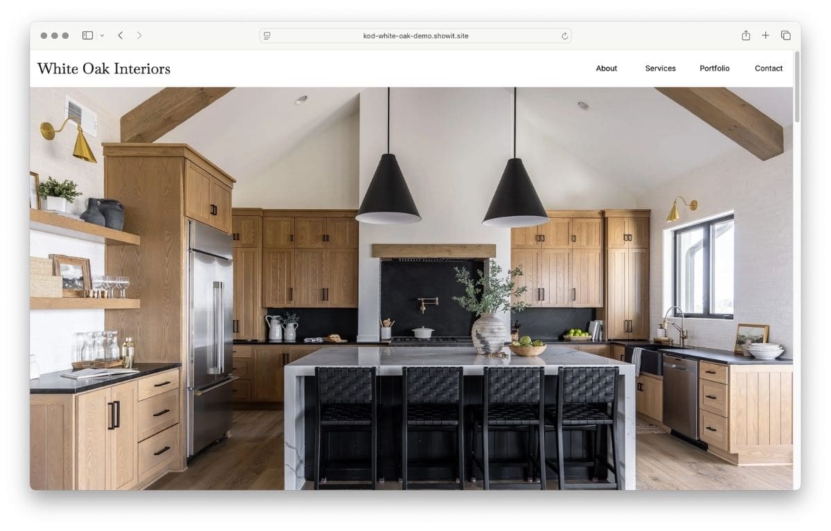 Published Showit website for an interior design studio with a warm oak kitchen hero image